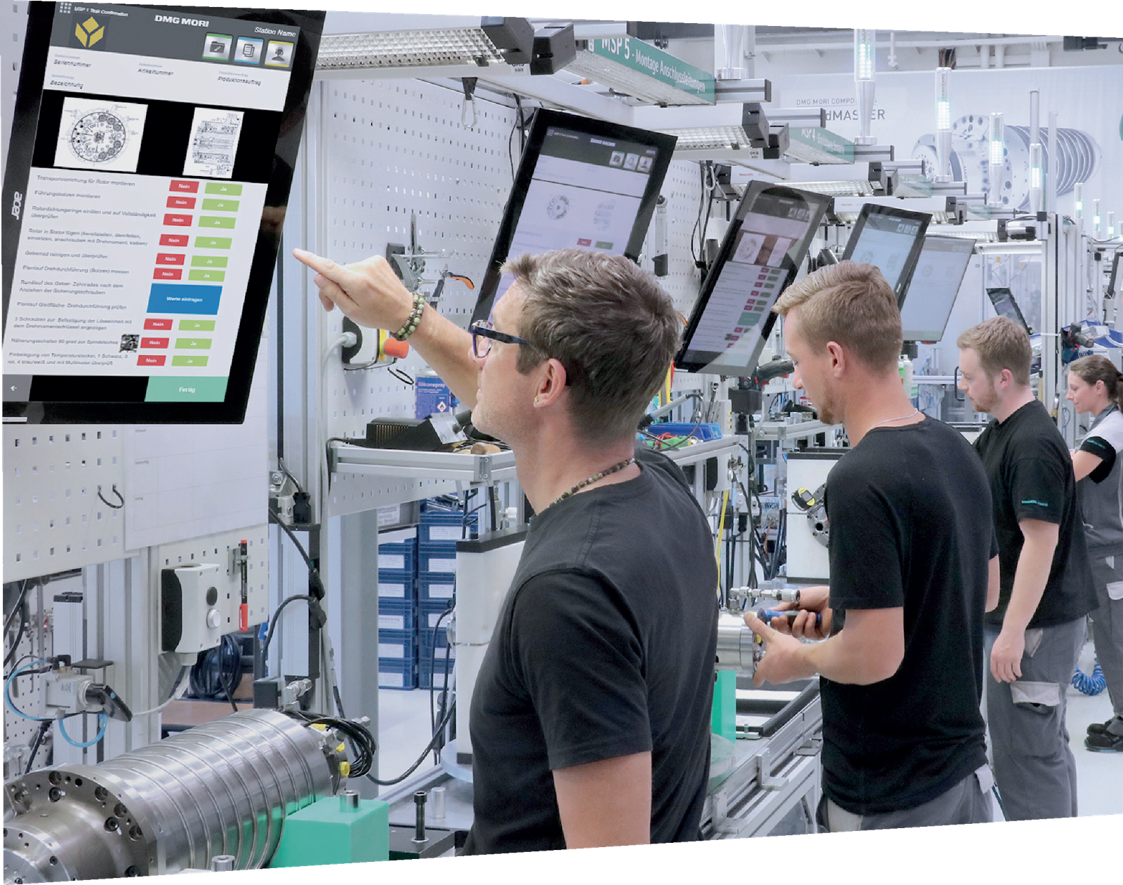 Close-up of people taking notes on clipboards during a meeting