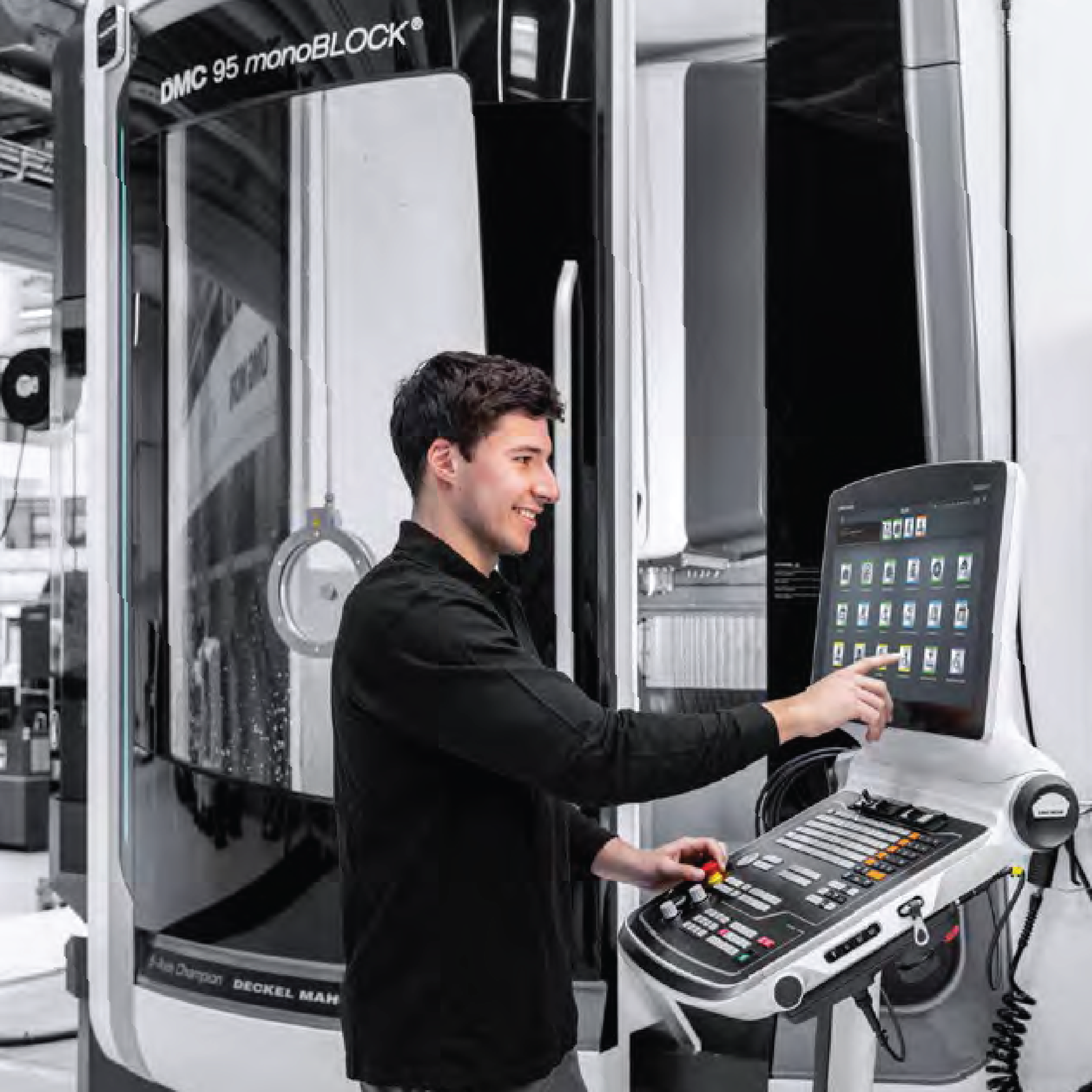 Workshop interior with machinery and workers