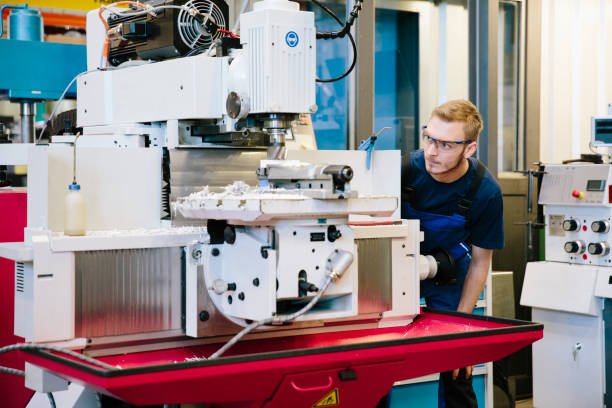 Man working on wood furniture in workshop
